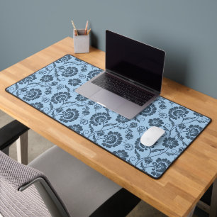 Elegant bloempatroon op lichte blauwe achtergrond bureaumat