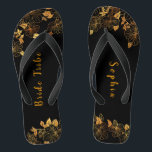 Elegant Bride Tribe Black & Gold Foliage Patroon Teenslippers<br><div class="desc">Deze elegante bruidtribe zwarte en goudbladerpatroon teenslippers bieden een luxueus zwart en goudpalet, met een verbluffend gouden bloeipatroon en moderne typografie tegen een zwarte achtergrond, met uitbundige elegantie en verfijning. Het is een prachtig cadeau voor je bruidstribe. Uitzicht het collectie op deze pagina om overeenkomende objecten te vinden. ♥ deze...</div>