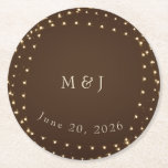 Elegant Brown & Gold String Lights wedding Ronde Kartonnen Onderzetter<br><div class="desc">Protect your surfaces with style using these elegant,  personalized wedding coasters. Featuring a sophisticated espresso brown backdrop and a circular frame of shimmering golden fairy lights,  this design highlights the couple's monogram and wedding date. Perfect for rustic receptions,  barn weddings,  or as a charming keepsake for guests.</div>