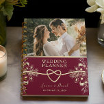 Elegant Burgundy Wedding Planner<br><div class="desc">Begin aan uw reis naar bruiloft gelukzaligheid met onze boeiende rode bordeaux bruiloft planner, exuding rustieke charme en bohemian flair. Deze planner is delicaat versierd met bloemenmotieven en moderne chique elegantie en heeft een romantisch touw hartaccent en ingewikkelde vergulde gouden bloemenkanten details. Compleet met een persoonlijke touch, is er een...</div>