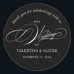 Elegant Calligraphy Black and White Wedding Ronde Sticker<br><div class="desc">Deze kalligrafie bruiloft sticker zal de perfecte aanvulling op uw gunsten of enveloppen om een over-the-top elegante bruiloft te vieren. Het script lettertype voegt een vleugje verfijning toe terwijl de moderne lay-out het fris en stijlvol houdt. Het is de perfecte manier om te vieren met je geliefden en je speciale...</div>