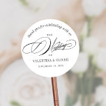 Elegant Calligraphy Wedding Ronde Sticker<br><div class="desc">Deze kalligrafie bruiloft sticker zal de perfecte aanvulling op uw gunsten of enveloppen om een over-the-top elegante bruiloft te vieren. Het script lettertype voegt een vleugje verfijning toe terwijl de moderne lay-out het fris en stijlvol houdt. Het is de perfecte manier om te vieren met je geliefden en je speciale...</div>