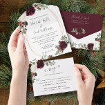 Elegant Christmas Burgundy Winter Wedding All In One Uitnodiging<br><div class="desc">This Christmas winter wedding all in one invitation is perfect for an elegant holiday wedding. The design features beautiful watercolor white and burgundy florals with pine, holy berry and eucalyptus greenery. This is a perfect color scheme for a winter wedding. Make this invitation your own by including your names and...</div>