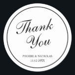 Elegant Classy Black and White Wedding Hartelijk d Ronde Sticker<br><div class="desc">Traditionele sticker voor bruiloft in klassiek zwart-wit met een eenvoudig design met "Dank u" in een elegante kalligrafie binnen een dunne rand. Dit stijlvolle ontwerp is perfect voor een formele bruiloft. Deze stickers zijn groot als envelopzegels of voor partijgunsten.</div>