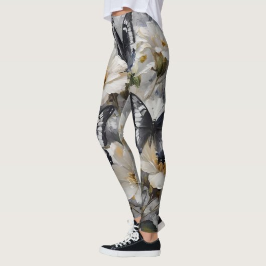 Elegant contrast: zwarte en witte vlinders leggings (Links)