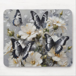 Elegant contrast: zwarte en witte vlinders muismat