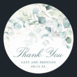 Elegant Eucalyptus Greenery Wedding Bedankt Ronde Sticker<br><div class="desc">Elegant bruiloft bevoordeelt stickers met eucalyptusbladeren en groenery met een blauwe vlek en spuugjes van faux goudglitter,  boven een pastel waterverf was. Hieronder staat "Dank u" samen met uw namen en datum in donkergroen. Dit eenvoudige,  rustige ontwerp is geweldig voor een botanische bruiloft in de zomer.</div>