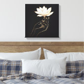 Elegant Feminine Hand Holding Magnolia Flower Canvas Afdruk (Insitu (Slaapkamer))