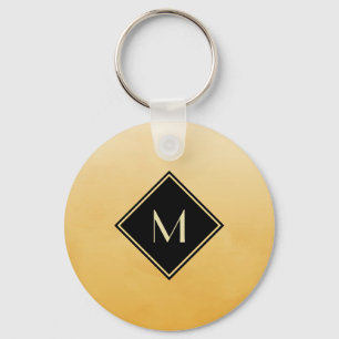 Elegant geel geborsteld met eenvoudig goudmonogram sleutelhanger