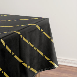 Elegant geometrisch goud patroon op zwart tafelkleed