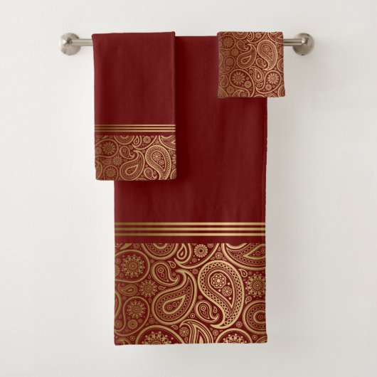 Elegant goud paisley patroon op rood bad handdoek (Insitu)