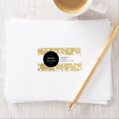 Elegant gouden bloemenontwerp met vet zwart etiket (Insitu)