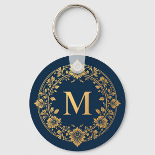 Elegant gouden bloemmotief monogram ontwerp sleutelhanger