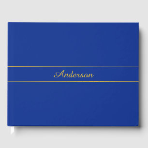 Elegant gouden script op de blauwe achtergrond van gastenboek