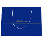 Elegant gouden script op de blauwe achtergrond van groot cadeauzakje (Voorkant)