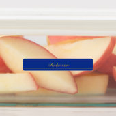 Elegant gouden script op de blauwe achtergrond van labels (Aangebracht)