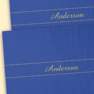 Elegant gouden script op de blauwe achtergrond van tissuepapier