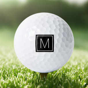 Elegant initiaal op zwart vierkant golfballen