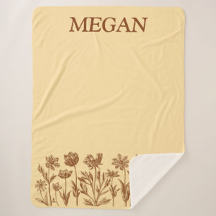 Elegant minimalistisch bloemontwerp met monogram sherpa deken
