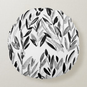 Elegant monochroom: natuurlijk bladeren patroon rond kussen