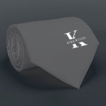 Elegant Monogram Gray | wit Stropdas<br><div class="desc">Een elegante stropdas met een vettig wit monogram op een zilvergrijze achtergrond. Bovenop dit monogram staat uw voor- of achternaam, die in alle hoofdsteden is vermeld.</div>