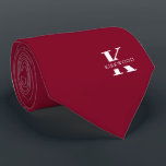 Elegant Monogram Helder Burgundy | Wit Stropdas<br><div class="desc">Een elegante das met een opvallend wit monogram op een helder bordeauxrode achtergrond. Bovenop dit monogram staat je voor- of achternaam in hoofdletters gespeld. Als je een opvallendere look wilt voor de persoonlijke naam binnen de grote letter, kun je het volgende doen: gebruik de functie "aanpassen/bewerken" en klik op de...</div>