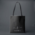 Elegant Monogram Zwart Wit Modern Minimalistisch  Tote Bag<br><div class="desc">Personaliseer deze stijlvolle boodschappentas met je naam initiaal monogram. Design heeft een eenvoudig aangepast monogramontwerp in klassieke witte moderne minimalistische typografie op een zwarte achtergrond. Eenvoudig aan te passen. Perfect als cadeau voor al je dierbaren. Pak er zelf ook een.</div>