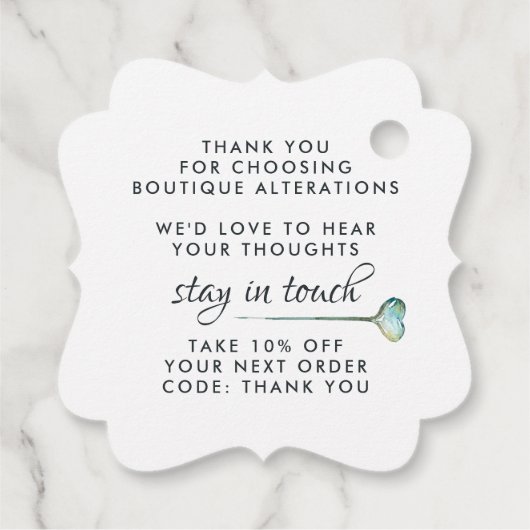 Elegant naaimachine | Label hangen (Achterkant)