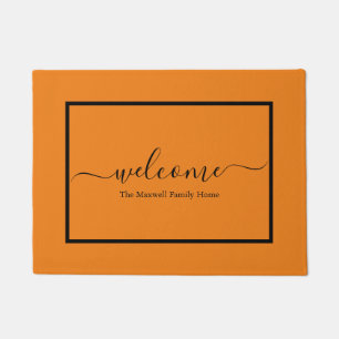 Elegant oranje zwarte manuscriptfamilienaam welkom deurmat