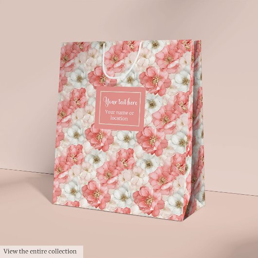 Elegant pink flowers and gold monogram gift bag medium cadeauzakje