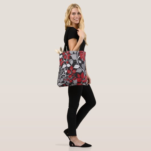 Elegant rood en zwart blad ontwerp tote bag (Op model)