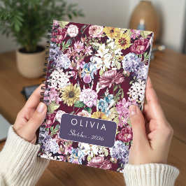 Elegant rood geel bloemmotief met monogram notitieboek