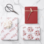 Elegant Rood Wit Merry Christmas Ornament Inpakpapier Vel<br><div class="desc">Een elegante set van drie coördinerende inpakpapier vellen in een feestelijk rood en wit kleurenpalet. Een daarvan is Merry Christmas,  geschreven in een modern handgeschreven lettertype. De tweede is voorzien van kerstversiering patroon en de derde is een solide coördinerende rode</div>