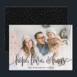 Elegant Script Full Photo Hope Love Hugs Black Feestdagenkaart<br><div class="desc">Verstuur de liefde dit seizoen naar je familie en vrienden met deze moderne, gestileerde kaarten van Orabella Prints. De elegante tekstbekleding leest, "hoop, liefde, & knuffels"in zwart over een witte gradiëntbekleding op de bodem van de kaart. De rug kenmerkt zeer kleine witte sneeuwstippen over een zwarte achtergrond, die aan om...</div>