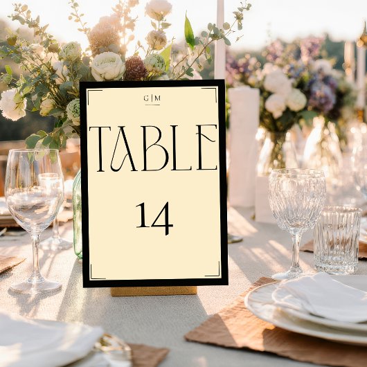 Elegant Serif Black Cream Monogram Table Number Kaart