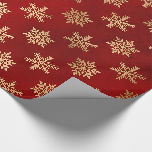 Elegant sneeuwvlokpatroon voor rode en gouden kers cadeaupapier (Hoek)