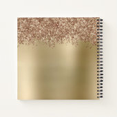 Elegant stijlvol roos goudglitter make-up en haar notitieboek (Achterkant)