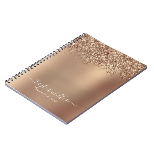 Elegant stijlvol roos goudglitter make-up en haar notitieboek (Linkerzijde)