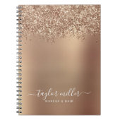Elegant stijlvol roos goudglitter make-up en haar notitieboek (Voorkant)
