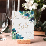 Elegant stoffig blauw goud Bloemen Waterverf Bruil Kaart<br><div class="desc">Leid uw gasten naar hun zitplaatsen met onze Deep Blue Floral Terrarium Tafelnummers. Met handgeschilderde blauwe bloemen en weelderig groen, voegen deze cijfers een vleugje natuurlijke elegantie toe aan uw huwelijksdecor. Omhuld in een gouden geometrisch terrarium lijst, het ontwerp combineert naadloos de moderne stijl met botanische charme, waardoor elke tafel...</div>