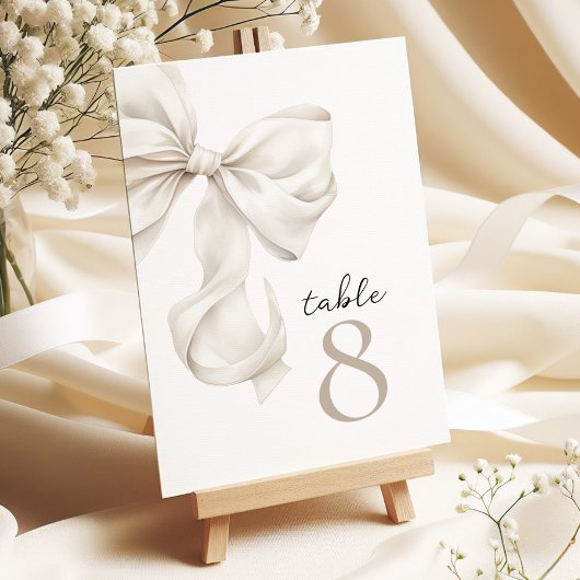 Elegant White Bow Table Numbers Kaart