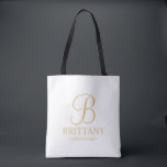 Elegant White en Gold Specialized Bridesmaid Tote Bag<br><div class="desc">Elegant Gepersonaliseerde Bridesmaid Gifts met gepersonaliseerd monogram in gouden elegante stijl van de manuscriptdoopvont met de naam en de titel van de bruidsmeisje in gouden klassieke stijl van de serif doopvont. Ook perfect voor Maid of Honor, Bloemenmeisje, moeder van de Bride en nog veel meer. Opmerking: de details van de...</div>