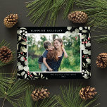 Elegant Winter Watercolor Greenery Botanical Photo Feestdagenkaart<br><div class="desc">This elegant holiday photo card features a single horizontal photo framed by beautiful watercolor eucalyptus, holly, and berries over a chic black background. The editable greeting on the front says "Happiest Holidays". The back of the card is a simple black background to which you can add another photo and/or additional...</div>
