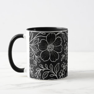 Elegant wit bloemenpatroon zwart mok