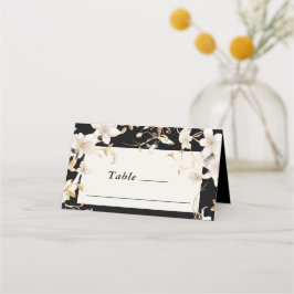 Elegant wit bloemontwerp op zwarte trouw plaatskaartje