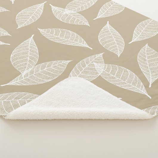 Elegant wit leder met botanische glans en taupe sherpa deken (3/4)