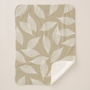 Elegant wit leder met botanische glans en taupe sherpa deken