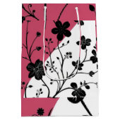Elegant zwart bloemensilhouet op roze en wit medium cadeauzakje (Achterkant)