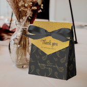 Elegant zwart en glanzend goud dank u bruiloft bedankdoosjes