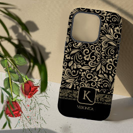 Elegant zwart en goud bloemenmonogram iPhone 16 pro hoesje